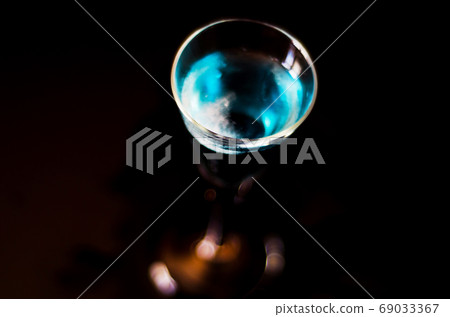 refreshing liqueur in a tall glass, alcoholic refreshing liqueur in a tall glass, alcoholic 69033367