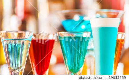refreshing liqueur in a tall glass, alcoholic refreshing liqueur in a tall glass, alcoholic 69033369