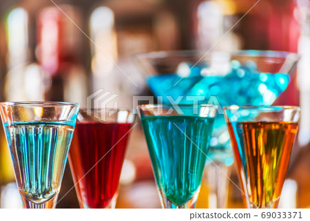 refreshing liqueur in a tall glass, alcoholic refreshing liqueur in a tall glass, alcoholic 69033371