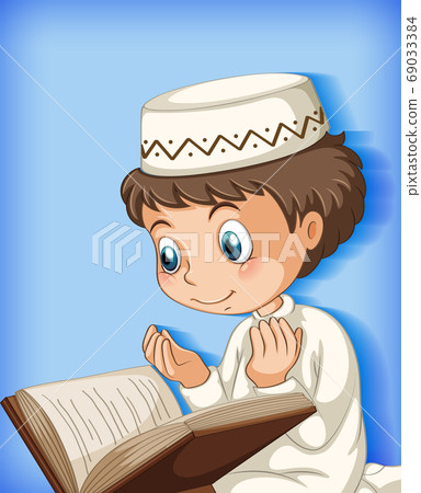Muslim boy reading from the quran 69033384