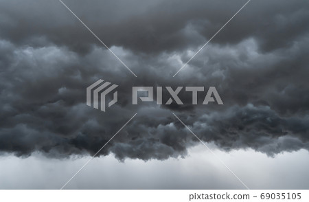 Dramatic dark grey clouds sky with thunder storm and rain. Abstr 69035105