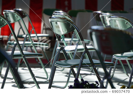 Graduation Ceremony with Pipe Chairs 69037470