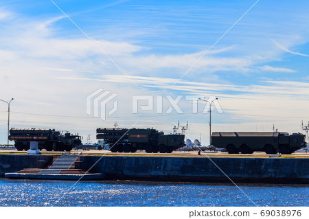 Military vehicles at a pier in Kronstadt, Russia Military vehicles at a pier in Kronstadt, Russia 69038976