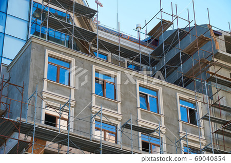 scaffolding and new building as background 69040854
