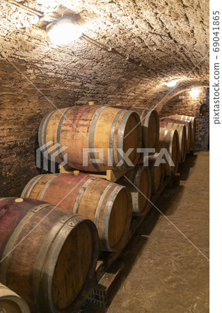 wine cellar with wooden barrels in Hajos, Southern wine cellar with wooden barrels in Hajos, Southern 69041865