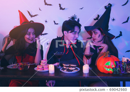 Young Thai People in Costumes Celebrating Halloween. Group of Yo Young Thai People in Costumes Celebrating Halloween. Group of Yo 69042980