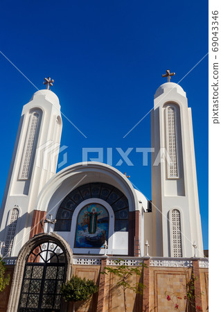 Facade of Coptic Orthodox church in Hurghada 69043346