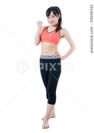Muscle training girl who guts pose whole body Muscle training girl who guts pose whole body 69046582