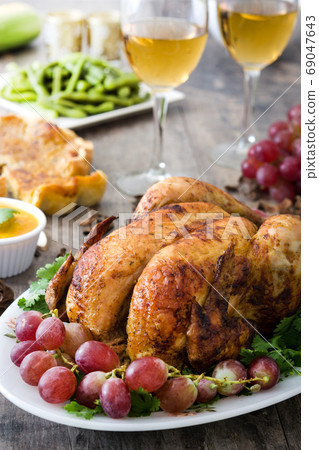 Thanksgiving dinner on rustic wooden background	 69047643