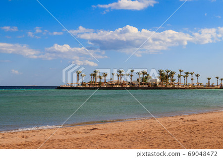 View of Red sea coast on the beach in Hurghada View of Red sea coast on the beach in Hurghada 69048472