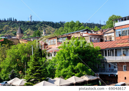 View of the Tbilisi city in Georgia on sunny day View of the Tbilisi city in Georgia on sunny day 69048617