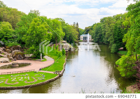 View of a lake with Snake Fountain and Flora View of a lake with Snake Fountain and Flora 69048771