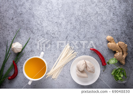 Spicy asian soup ingredients on gray background 69048830