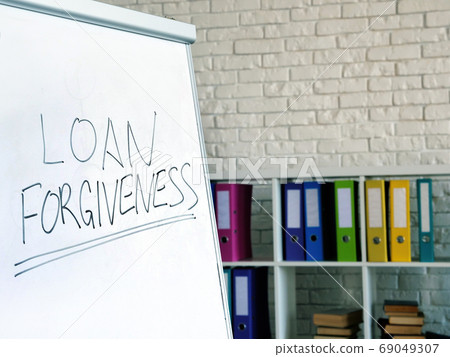 Loan forgiveness inscription on the white board in office. 69049307