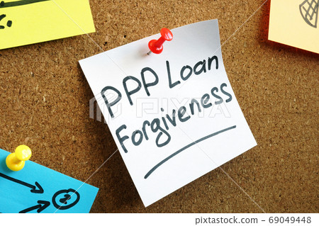 PPP loan forgiveness memo on the board. 69049448