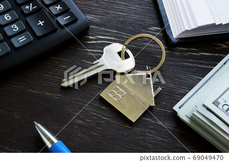 First time home buyer loan mortgage. Key and money. First time home buyer loan mortgage. Key and money. 69049470