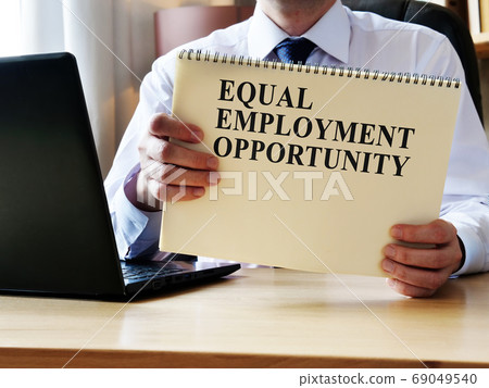 EEO equal employment opportunity. The manager shows the rules and guidelines. 69049540