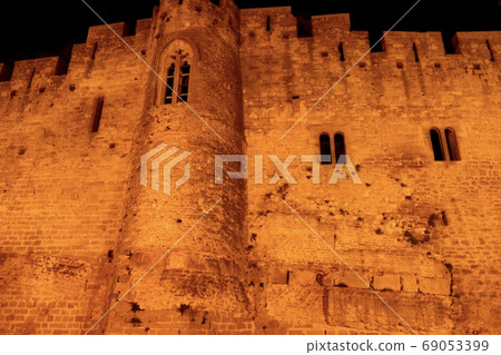 Carcassonne castle wall at night 69053399
