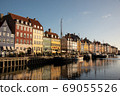 Facades of bright colored houses at Nyhavn 69055526
