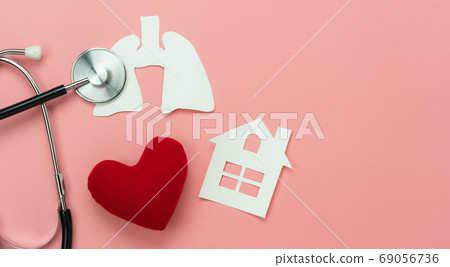 Table top view aerial image of accessories healthcare & medical of National Organ Donor Day with Valentines day background concept.Stethoscope with lung red heart and home on pink paper.copy space Table top view aerial image of accessories healthcare & medical of National Organ Donor Day with Valentines day background concept.Stethoscope with lung red heart and home on pink paper.copy space 69056736