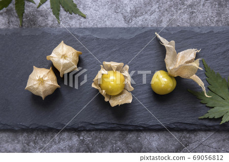 Eating boiled on a slate plate 69056812
