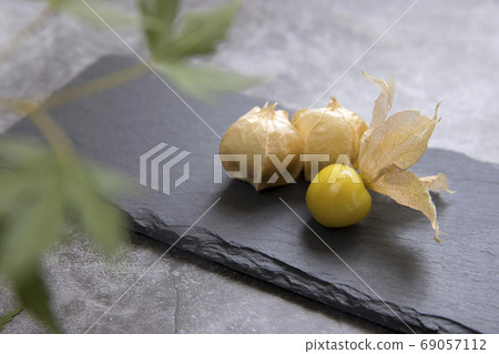 Eating boiled on a slate plate 69057112