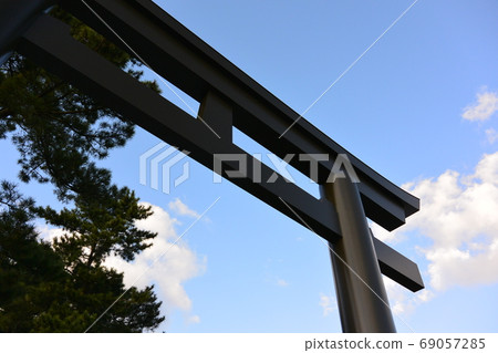 Blue sky, clouds, torii and pine trees Blue sky, clouds, torii and pine trees 69057285