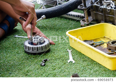 Motorcycle engine repair Motorcycle engine repair 69058973