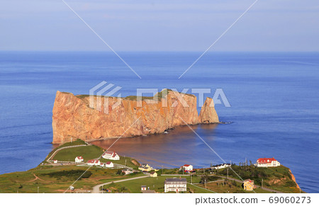 Aerial view of Perce Rock and village in Quebec Aerial view of Perce Rock and village in Quebec 69060273