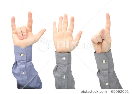 Raised hands of different men on white background 69062001