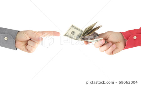 Man's hand gives dollar bills to other people. Business and Fina Man's hand gives dollar bills to other people. Business and Fina 69062004