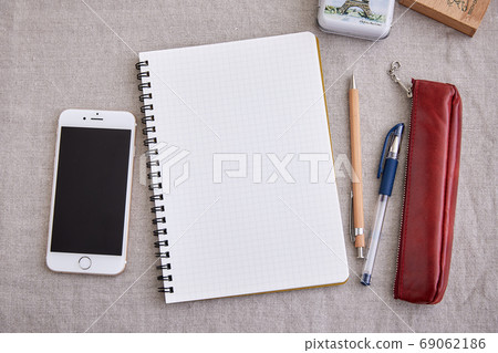 Notepad, writing instrument and smartphone Notepad, writing instrument and smartphone 69062186