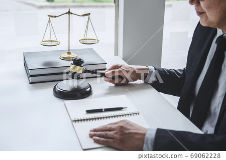 Judge gavel with Justice lawyers, Counselor in suit or lawyer wo 69062228