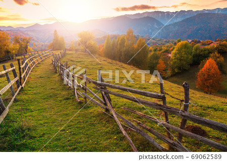 Autumn alpine rural landscape near Brasov, Transylvania, Romania, Europe Autumn alpine rural landscape near Brasov, Transylvania, Romania, Europe 69062589