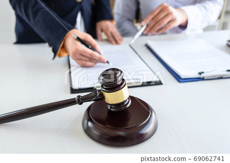 Professional female lawyer or counselor discussing 69062741