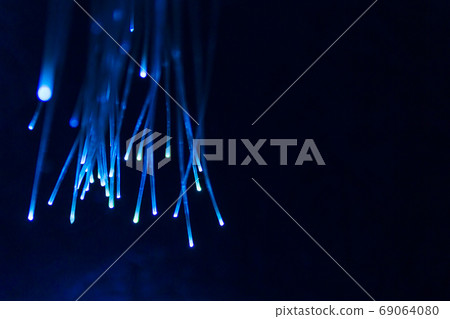 Neural networks.Blue neon lightnings of bokeh lights and reflections.Selective focus. Neural networks.Blue neon lightnings of bokeh lights and reflections.Selective focus. 69064080