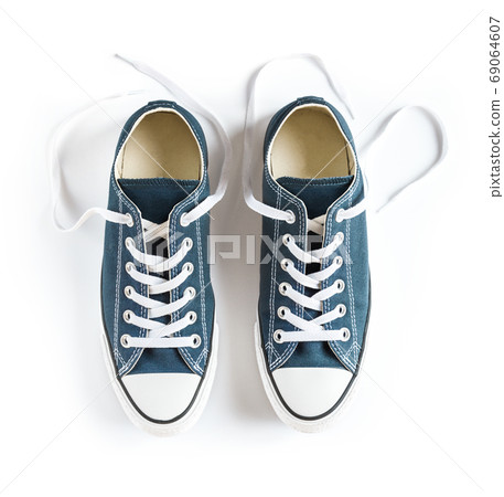 Blue sneakers isolated on white background 69064607