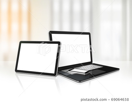 Laptop, mobile phone and digital tablet pc on office desk Laptop, mobile phone and digital tablet pc on office desk 69064638