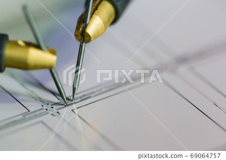 Manual probe system with needles for test of semiconductor on silicon wafer. Selective focus. 69064757