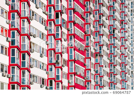 Part of Modern residential apartment with flat building exterior. Detail of new house and home complex. Fragment of city real estate property and condo architecture. Real estate market Part of Modern residential apartment with flat building exterior. Detail of new house and home complex. Fragment of city real estate property and condo architecture. Real estate market 69064787