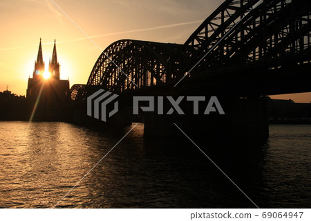 Cologne Koln Germany during sunset, Cologne bridge with cathedral Cologne Koln Germany during sunset, Cologne bridge with cathedral 69064947