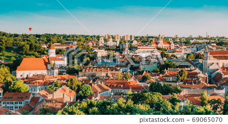 Vilnius, Lithuania. Summer Sunset Sunrise Over Cityscape Of Vilnius, Lithuania. Beautiful View Of Old Town at Evening Vilnius, Lithuania. Summer Sunset Sunrise Over Cityscape Of Vilnius, Lithuania. Beautiful View Of Old Town at Evening 69065070