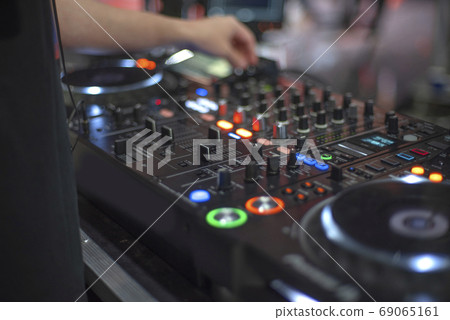 DJ mixing console DJ mixing console 69065161