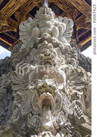 Indonesia - old hindu architecture on Bali island.Traditional statues. Indonesia - old hindu architecture on Bali island.Traditional statues. 69065929