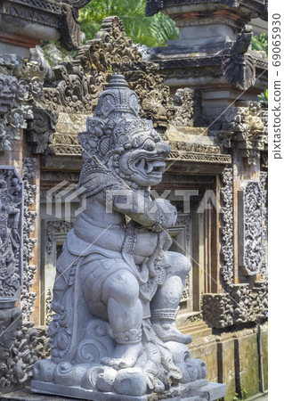 Indonesia - old hindu architecture on Bali island.Traditional statues. Indonesia - old hindu architecture on Bali island.Traditional statues. 69065930