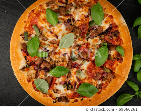 Traditional Italian Supreme Pizza with Meat Mix 69066261