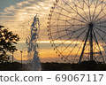Fountain ferris wheel sunset 69067117