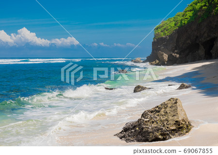 Tropical beach in Bali. Paradise beach and blue ocean, no people 69067855