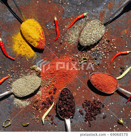 silver spoon with various spices silver spoon with various spices 69068578