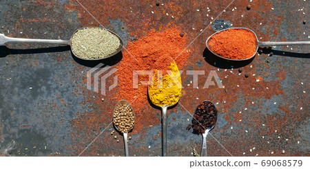 silver spoon with various spices silver spoon with various spices 69068579
